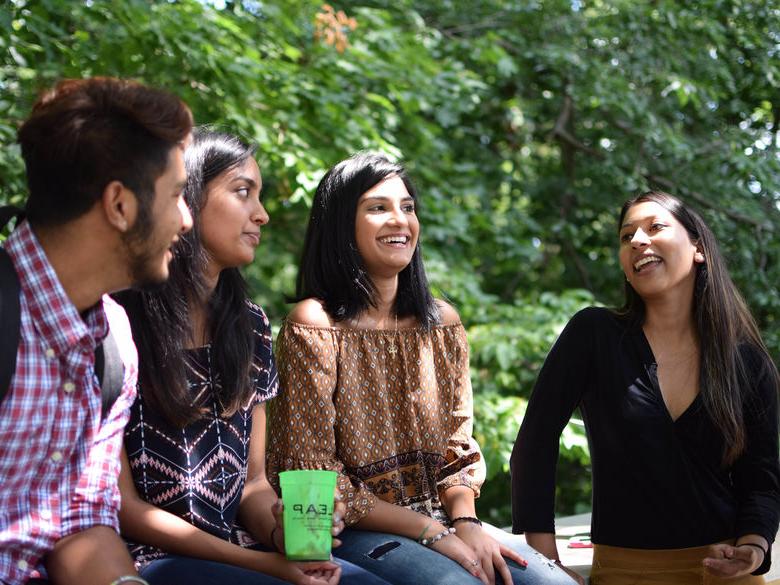 students talking to each other outside